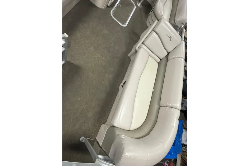 Slide: The Image of 2014 Bennington 22 SSX boat interior with beige leather seating. - 6