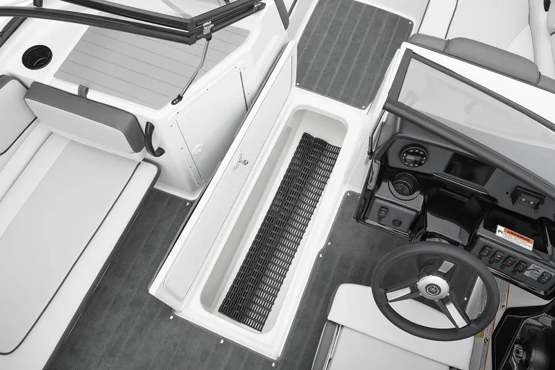Slide: The Image of Manufacturer Provided Image: 2026 Yamaha Boats AR190 interior with steering wheel and seating area. - 10