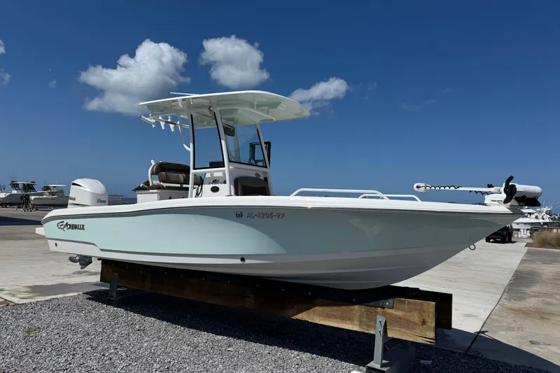The Image of 2020 Crevalle 24 HCO boat on display under clear blue sky. - 1