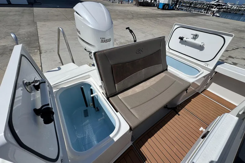 Slide: The Image of 2020 Crevalle 24 HCO boat with Yamaha 300 engine, featuring seating and storage compartments. - 12