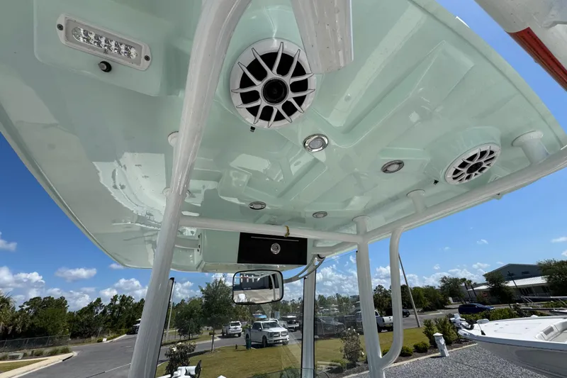 Slide: The Image of 2020 Crevalle 24 HCO boat with speakers and lights on the canopy. - 27