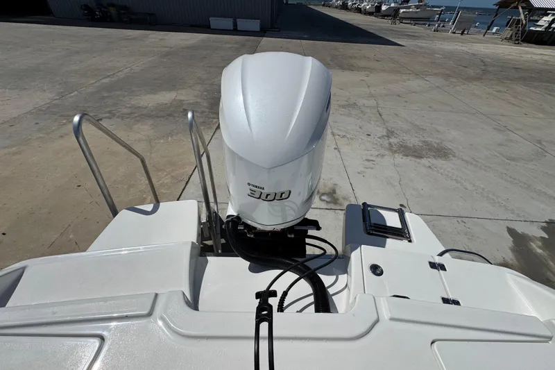 Slide: The Image of 2020 Crevalle 24 HCO boat with Yamaha 300 outboard motor at dockside. - 28