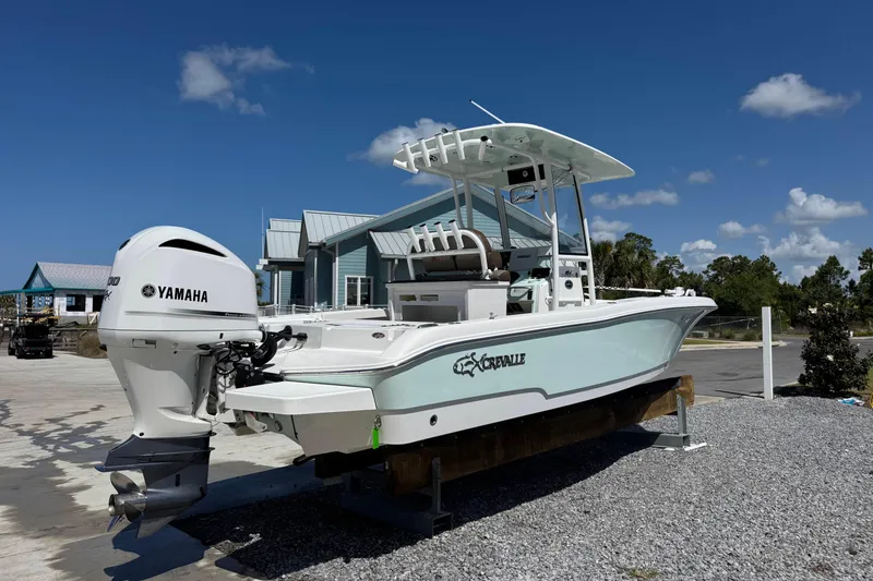 Slide: The Image of 2020 Crevalle 24 HCO boat with Yamaha engine on display outdoors. - 3