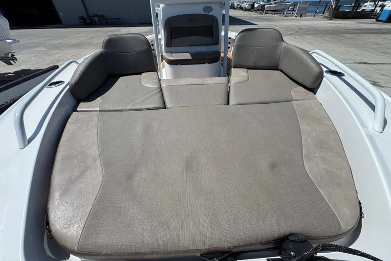 Slide: The Image of 2020 Crevalle 24 HCO boat with spacious cushioned seating area. - 30
