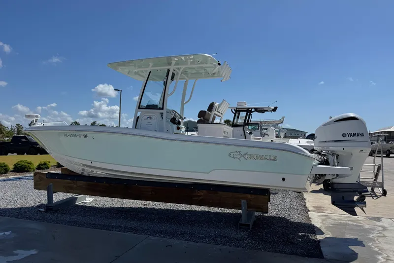 Slide: The Image of 2020 Crevalle 24 HCO boat with Yamaha engine on display under clear blue sky. - 6