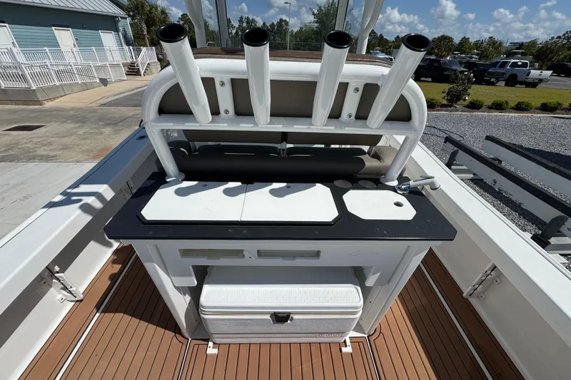 Slide: The Image of 2020 Crevalle 24 HCO boat with rod holders and storage compartments. - 9