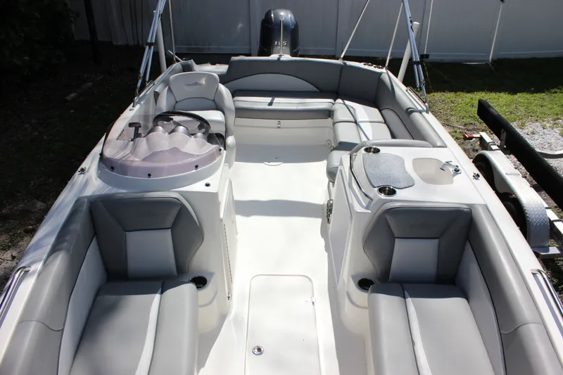 Slide: The Image of Interior view of a 2022 NauticStar 203 SC boat with gray seating. - 19