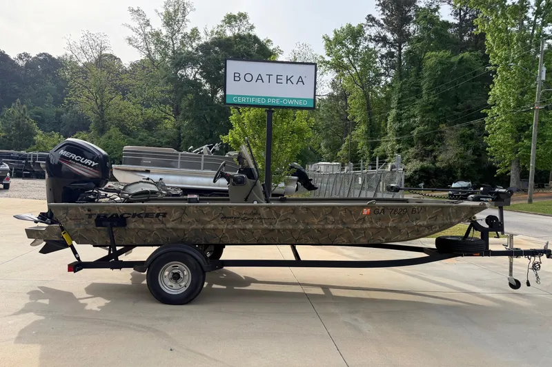 The Image of 2019 Tracker Grizzly 1860 CC Sportsman boat on trailer, certified pre-owned. - 0