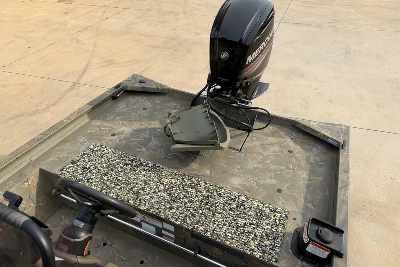 Slide: The Image of 2019 Tracker Grizzly 1860 CC Sportsman boat with Mercury outboard motor. - 7