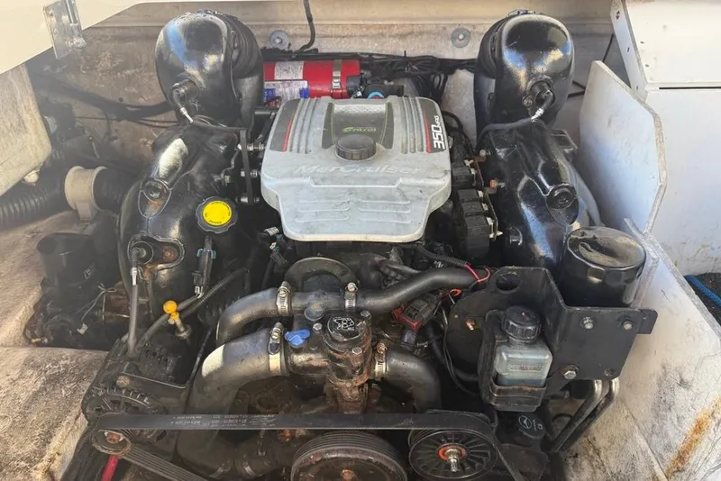 Slide: The Image of Engine of a 2012 Sea Ray 260 Sundeck boat, featuring a MerCruiser 350 MAG. - 15