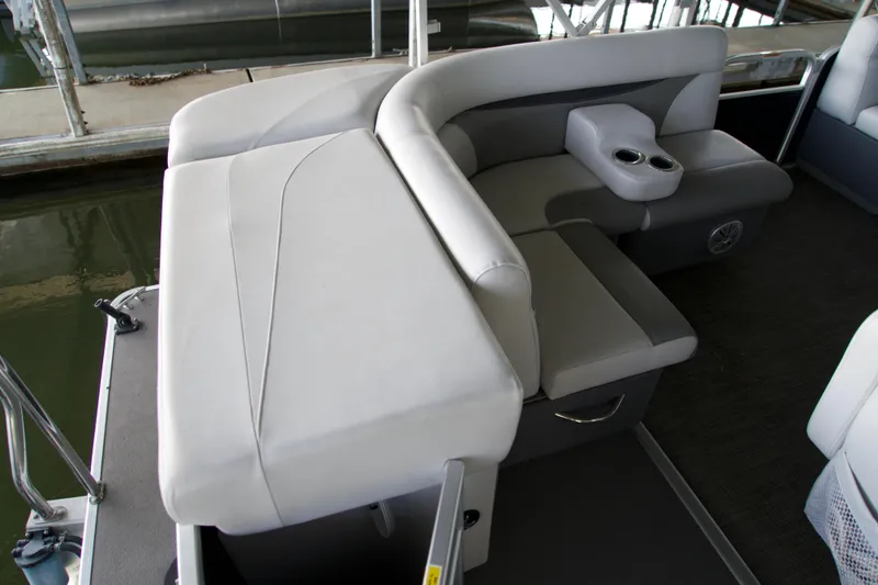 Slide: The Image of 2018 Godfrey Sweetwater20 boat interior with plush seating and cup holders. - 3