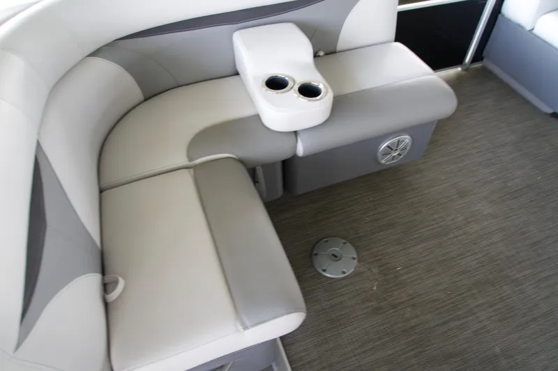 Slide: The Image of 2018 Godfrey Sweetwater20 boat interior with gray seating and cup holders. - 6