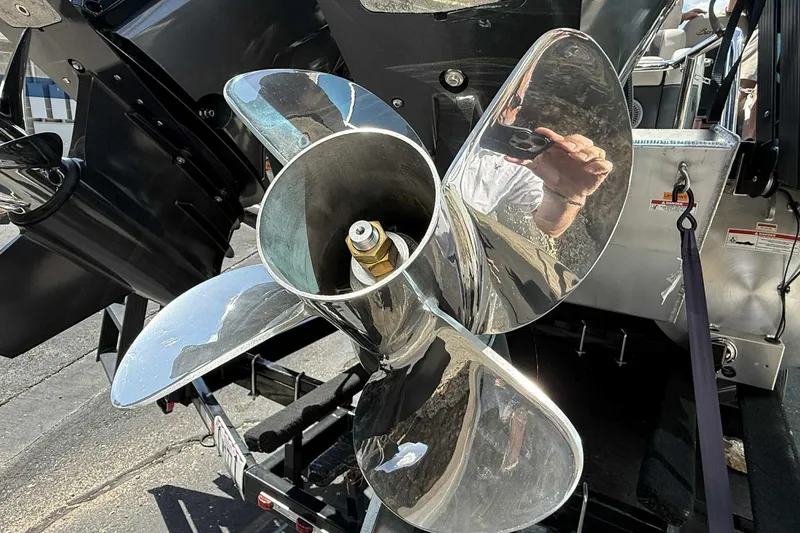 Slide: The Image of Close-up of a shiny boat propeller on a 2026 Barletta LUSSO 25UCAT. - 12
