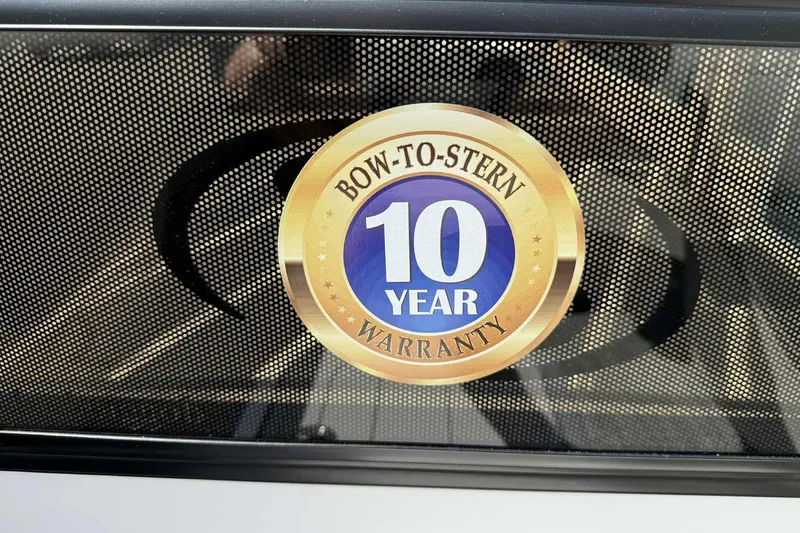 Slide: The Image of Barletta LUSSO 25UCAT 2026 with 10-year bow-to-stern warranty badge. - 14