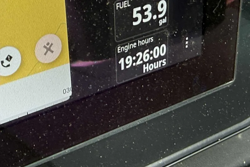 Slide: The Image of Display screen showing fuel level and engine hours on Barletta LUSSO 25UCAT, 2026 model. - 15