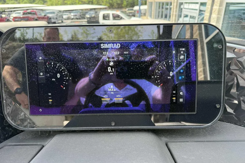 Slide: The Image of Simrad display on 2026 Barletta LUSSO 25UCAT, showing speed and RPM gauges. - 17