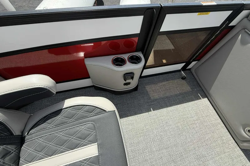 Slide: The Image of Interior of 2026 Barletta LUSSO 25UCAT boat with seating and cup holders. - 28