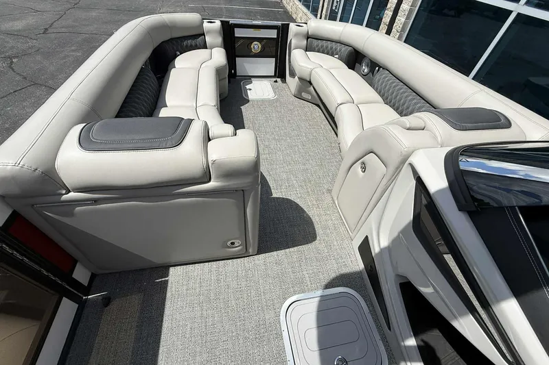 Slide: The Image of Luxurious interior of 2026 Barletta LUSSO 25UCAT pontoon boat with plush seating. - 29