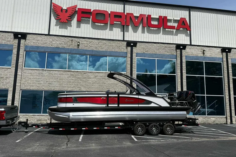 The Image of 2026 Barletta LUSSO 25UCAT pontoon boat on trailer outside Formula building. - 3