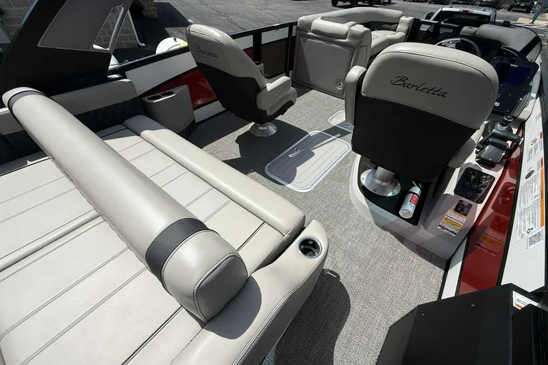 Slide: The Image of Luxurious interior of 2026 Barletta LUSSO 25UCAT pontoon boat with plush seating. - 36