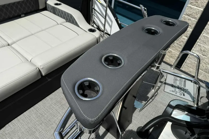 Slide: The Image of Interior of 2026 Barletta LUSSO 25UCAT with cup holders and seating. - 37