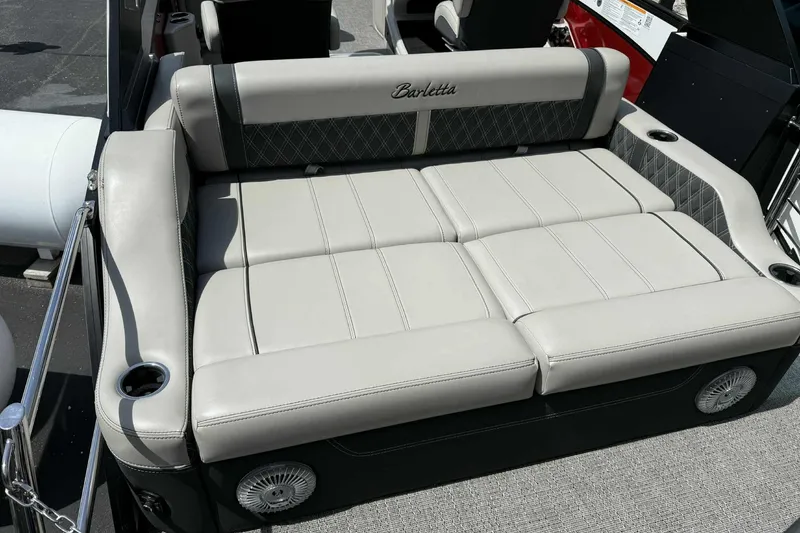 Slide: The Image of Luxurious seating on 2026 Barletta LUSSO 25UCAT pontoon boat, featuring cup holders and premium upholstery. - 38