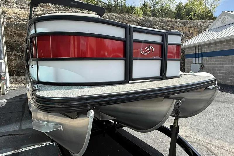 Slide: The Image of 2026 Barletta LUSSO 25UCAT pontoon boat with sleek red and white design. - 5