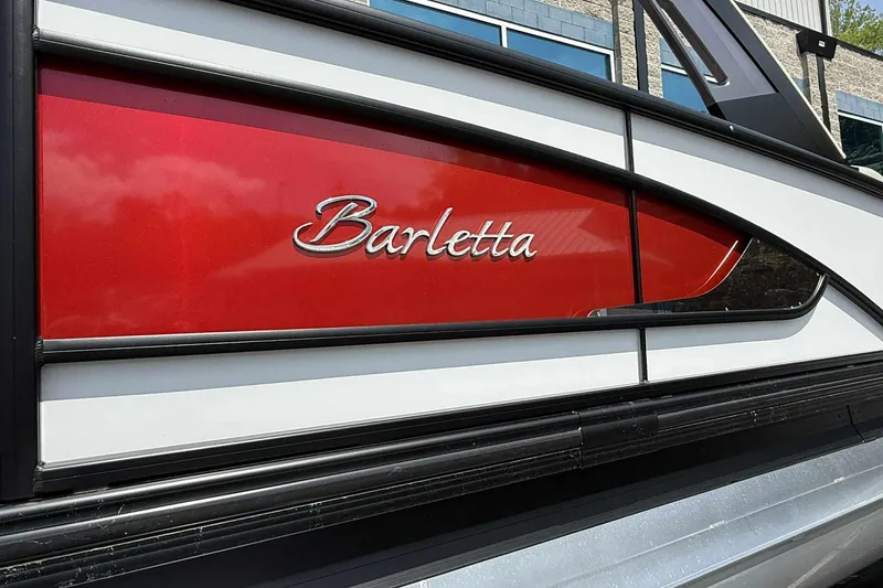 Slide: The Image of 2026 Barletta LUSSO 25UCAT boat with sleek red and white design. - 7