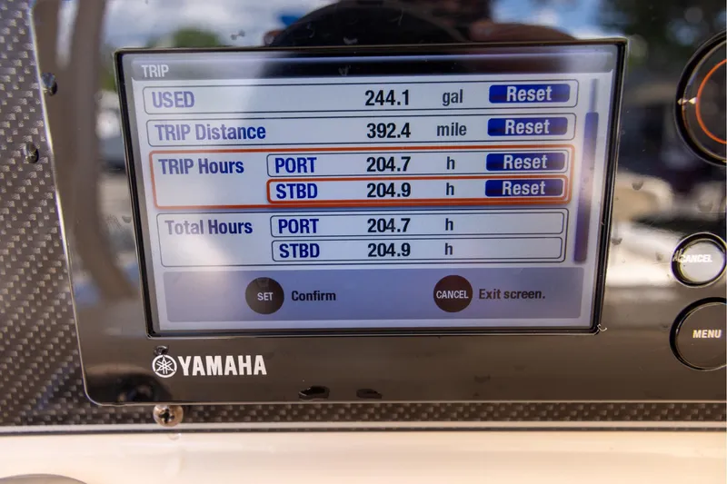 Slide: The Image of Yamaha display showing trip data on a 2016 Grady-White Canyon 306 boat. - 15