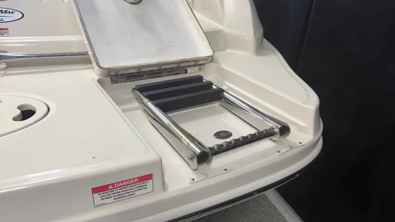 Slide: The Image of A swim platform with a retractable ladder on a 2007 Sea Ray 200 Sundeck. - 11