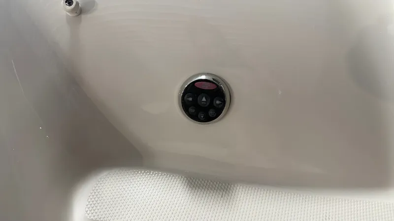 Slide: The Image of Close-up of a control panel on a 2007 Sea Ray 200 Sundeck boat. - 14