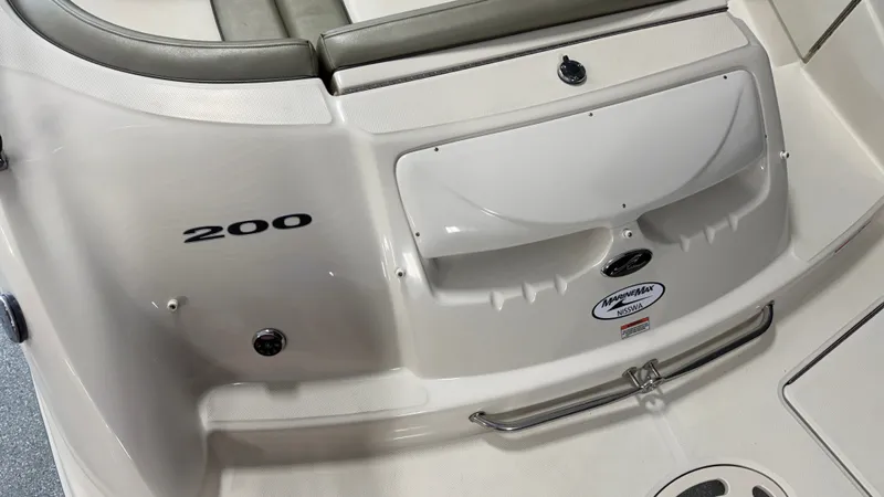 Slide: The Image of The image shows the stern of a 2007 Sea Ray 200 Sundeck boat with gray upholstery. - 13