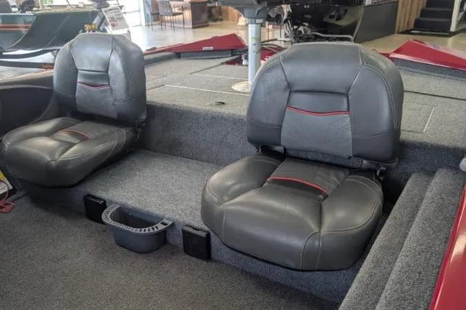 Slide: The Image of 2023 Tracker Pro Team 175 TF boat interior with two gray cushioned seats. - 4