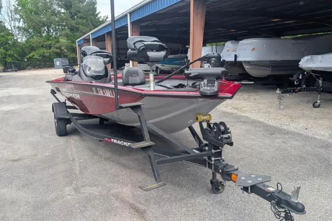 Slide: The Image of 2023 Tracker Pro Team 175 TF boat on trailer in storage area. - 6