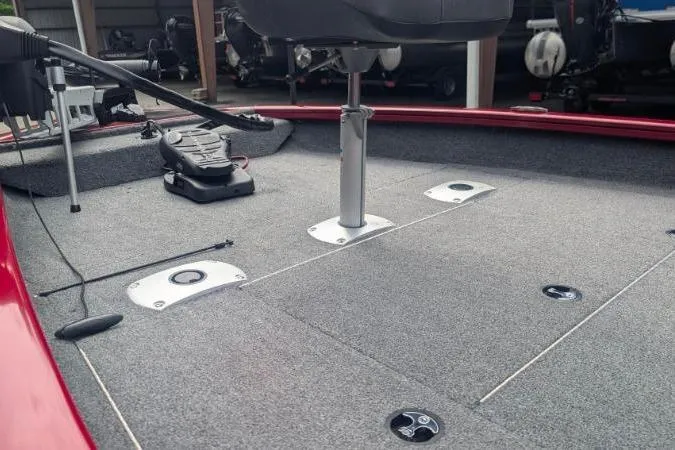 Slide: The Image of 2023 Tracker Pro Team 175 TF boat deck with seating and fishing equipment. - 9