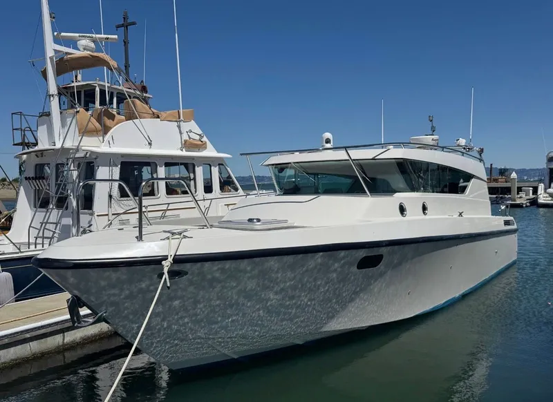 The Image of Delta Powerboats 40 Walk Around 2013 docked at harbor. - 0