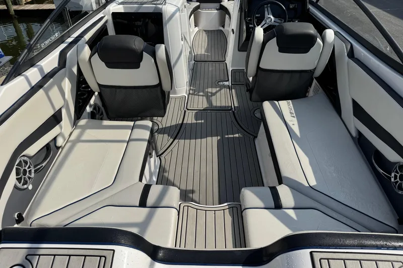 Slide: The Image of 2020 Yamaha Boats 242SE interior with sleek seating and modern design. - 10