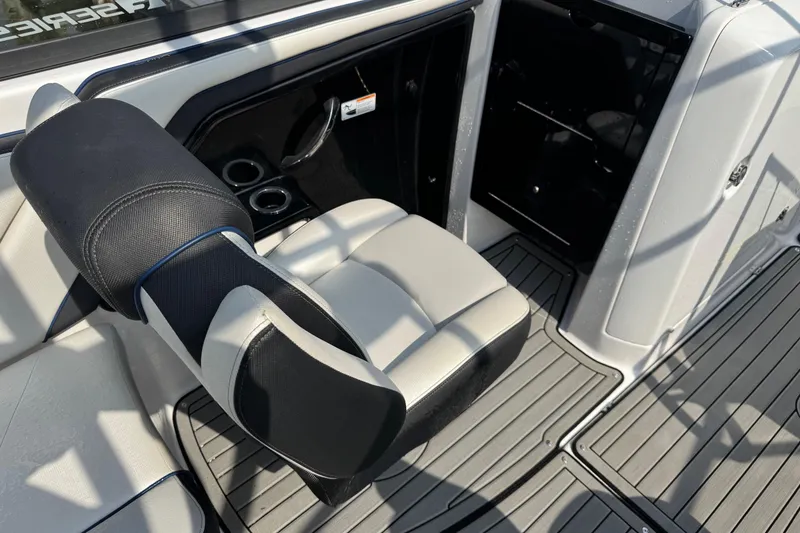 Slide: The Image of 2020 Yamaha Boats 242SE interior with sleek seating and modern design. - 11