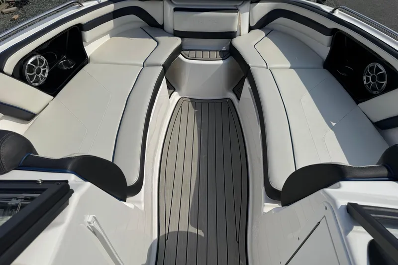 Slide: The Image of 2020 Yamaha Boats 242SE interior with sleek seating and modern design. - 13