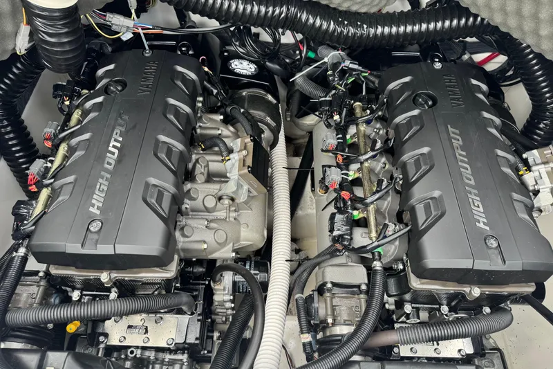 Slide: The Image of 2020 Yamaha Boats 242SE high output engines, detailed view of dual engine setup. - 7
