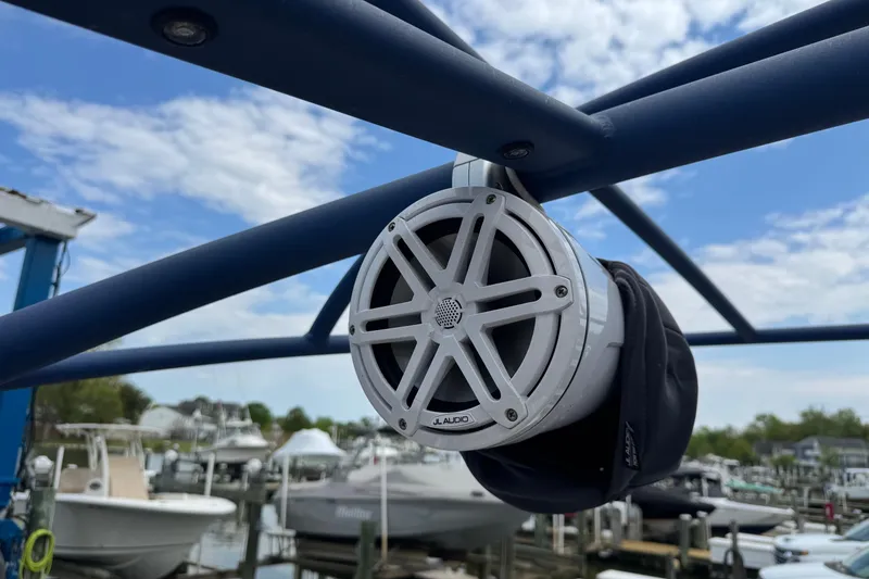 Slide: The Image of Speaker mounted on a 2020 Yamaha Boats 242SE, with marina background. - 8