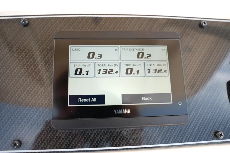 Slide: The Image of Yamaha display on 2023 Grady-White Fisherman 257 showing trip and usage data. - 27