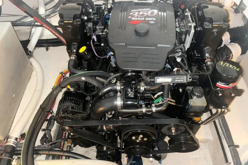 Slide: The Image of Engine of a 2008 Monterey 250 Cruiser boat, featuring a MerCruiser 350 MAG MPI. - 18