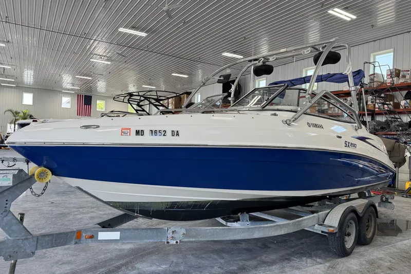 Slide: The Image of 2007 Yamaha Boats SX230 HO on trailer in indoor storage facility. - 2