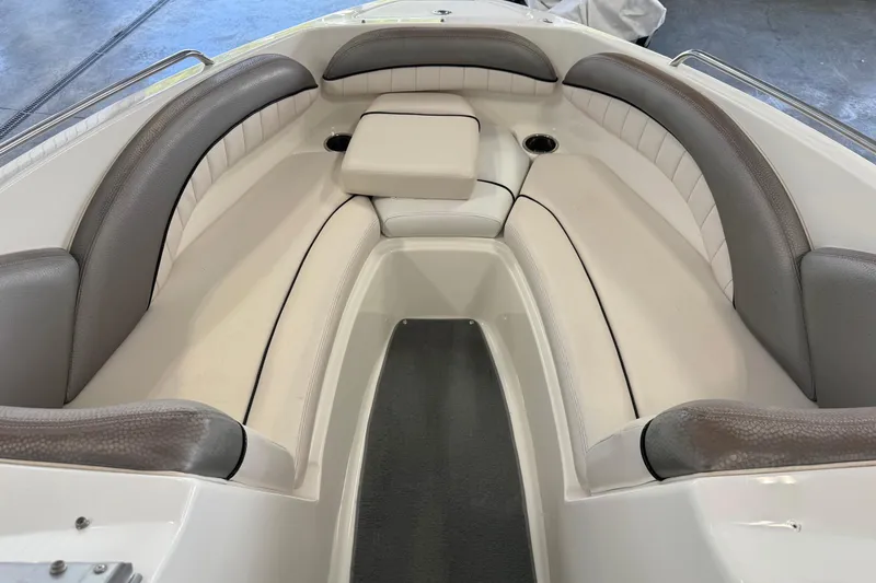Slide: The Image of 2007 Yamaha Boats SX230 HO interior seating with gray and white upholstery. - 4