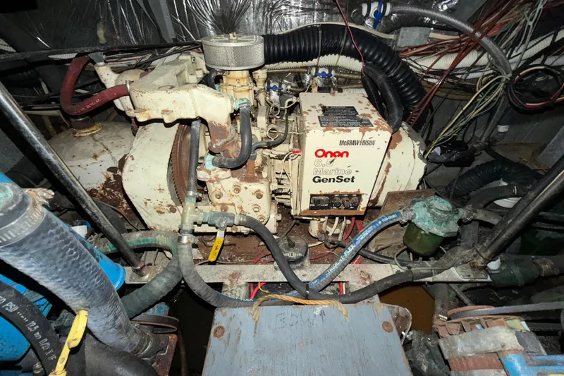 Slide: The Image of Engine room of 1984 Carver 3607 Aft Cabin Motor Yacht with Onan Marine GenSet. - 38