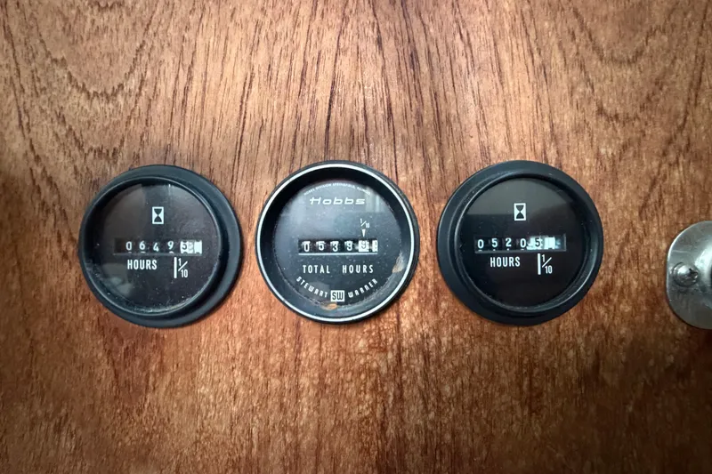 Slide: The Image of Hour meters on 1984 Carver 3607 Aft Cabin Motor Yacht dashboard. - 39