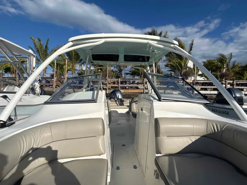 Slide: The Image of 2023 Key West 239 DFS boat with seating area and canopy. - 10