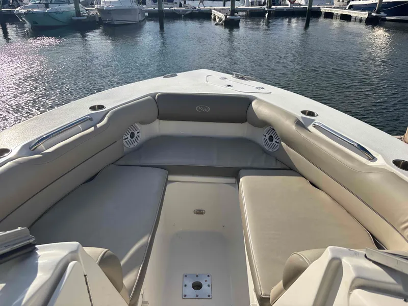 Slide: The Image of Interior view of a 2023 Key West 239 DFS boat at the marina. - 8