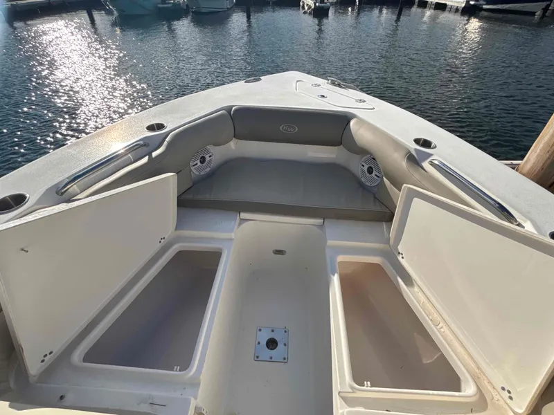 Slide: The Image of Key West 239 DFS boat with storage and seating area, 2023 model. - 9